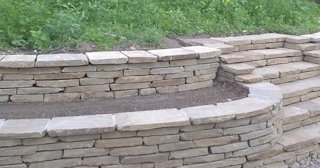 Установка подпорной стенки из камня в Городце - стоимость от 3543 руб.